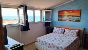 2 habitaciones, tabla de planchar con plancha, wifi y ropa de cama