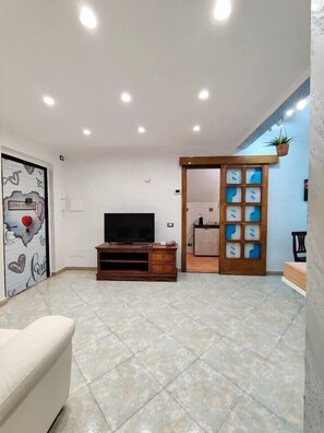 TV - Elegant Seafront Apartment in Ostia | Beach Access (Lido Di Ostia Ponente)