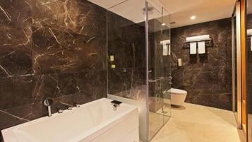 Club Suite | Bathroom | Shower, slippers