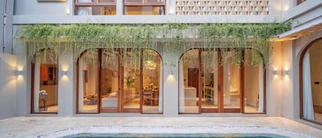 Outdoor pool, pool umbrellas, pool loungers