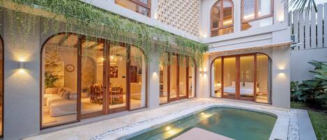 Outdoor pool, pool umbrellas, pool loungers