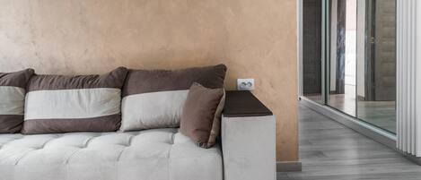 Deluxe Apartment, City View | Living area | Flat-screen TV