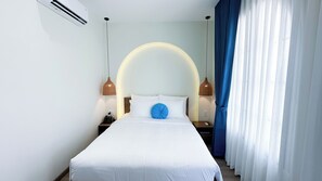 Eenvoudige kamer, 1 twee- of 2 eenpersoonsbedden, uitzicht op tuin | Gratis wifi