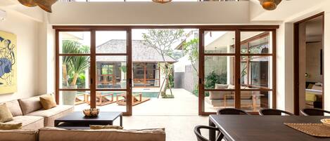 Deluxe Villa, 6 Bedrooms, Balcony, Pool View | Living area | 32-inch Smart TV with digital channels