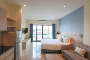 Executive studio | Verduisterende gordijnen, gratis wifi, beddengoed