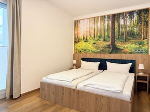 Habitación Deluxe con 1 cama doble o 2 individuales | Escritorio, espacio para trabajar con un portátil, wifi gratis