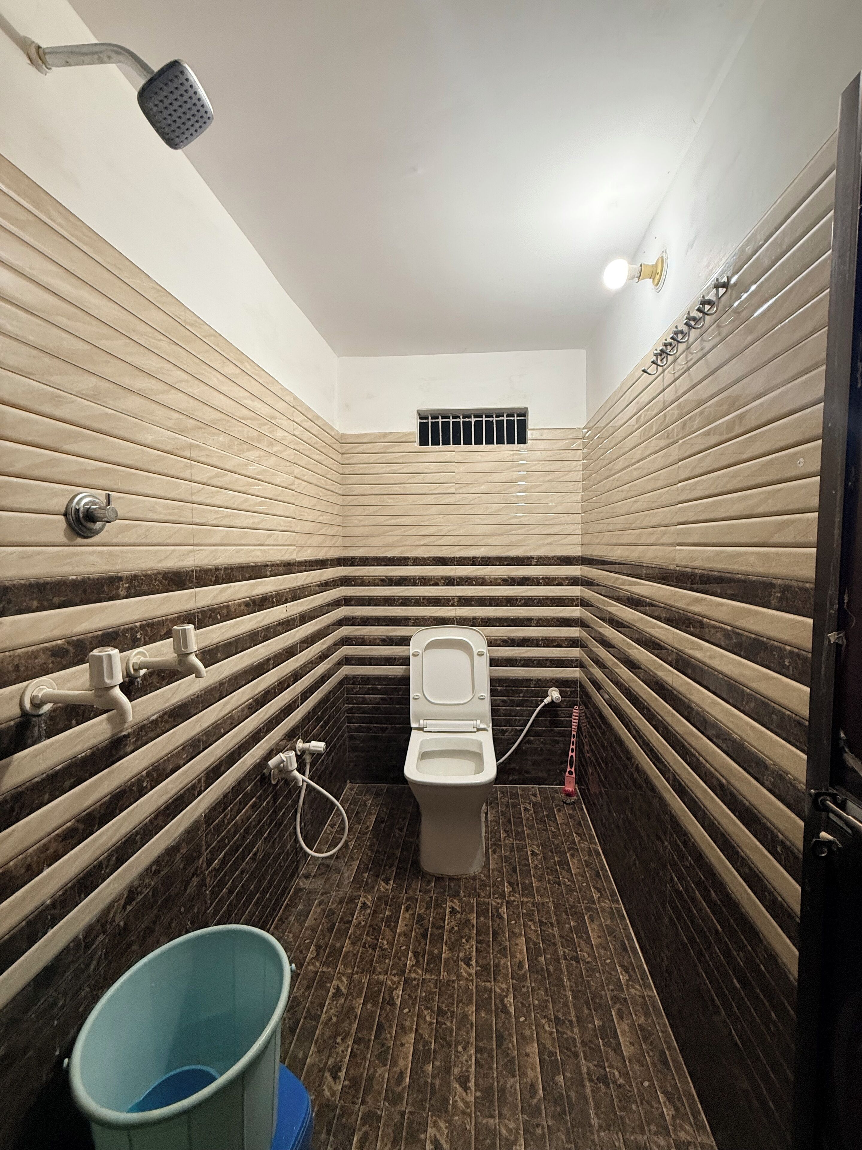 Bidet, towels, soap, toilet paper