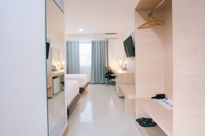 Executive-værelse med 2 enkeltsenge | Skrivebord, arbejdsområde til bærbare computere, gratis Wi-Fi