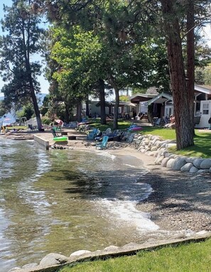 On the beach, sun-loungers, beach towels