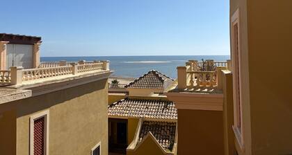 Seafront Apartment with Ocean Views, Wi-Fi, and Air Conditioning