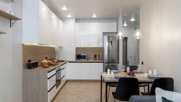 Classic Apartment, Balcony | Private kitchen | Electric kettle