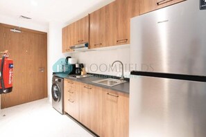 Apartamento, sacada | Cozinha privada