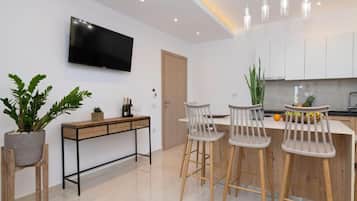 Deluxe Suite, Balcony, Sea View | Private kitchen | Stovetop, electric kettle, toaster, high chair