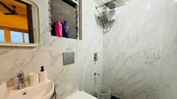 Shower, towels, soap, shampoo