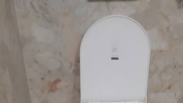 Shower, towels, soap, shampoo