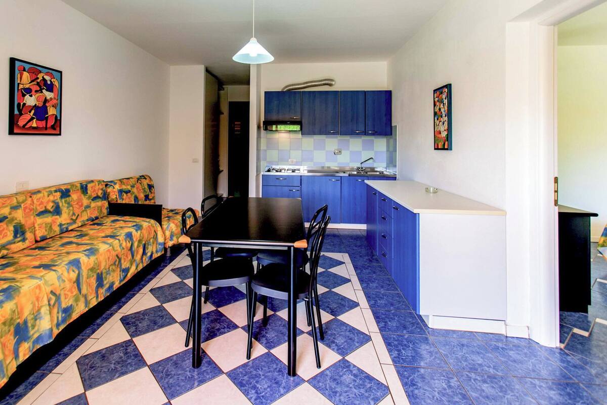 Appartement Confort, patio | Coin séjour | Télévision LCD de 22 pouces avec chaînes par satellite