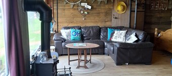 large cabin in enclosed garden with own parking ,stunning views ,pet friendly