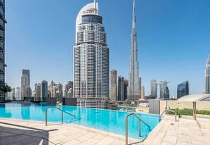 Outdoor pool - Stunning 3BR w/Burj Khalifa & Fountain View (Dubai)