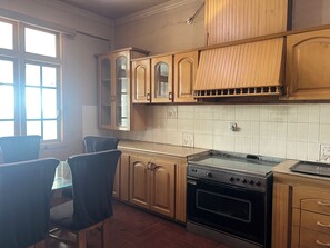 Deluxe Double Room, Mountain View | Private kitchen - Cedar & Sutoon (Abbottabad)