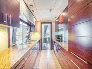 Fridge, microwave, oven, stovetop - HAVN - 1 Bedroom Apartment in Burj Views, Downtown (Dubai)