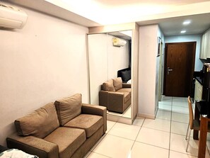 Apartment, 1 Bedroom, Smoking, Balcony | Living room - Budget Studio Condo With Resort-style Pool - Laguna Beach Resort 1, Jomtien (Pattaya)