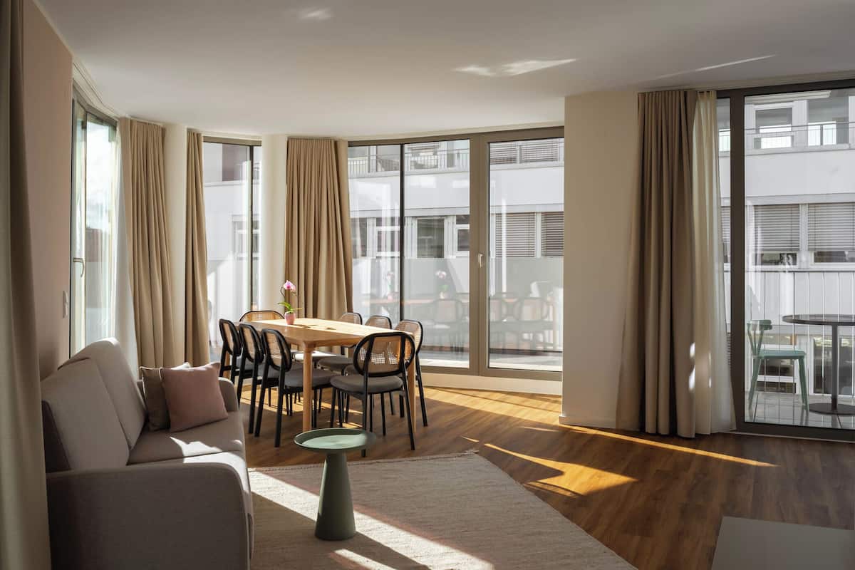 Three Bedroom Penthouse Suite | Living area | 50-inch flat-screen TV with cable channels