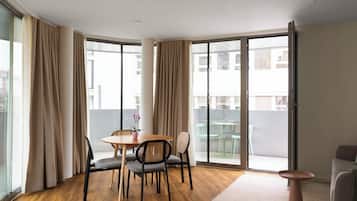 Comfort Suite Wheelchair Accessible | Living area | 50-inch flat-screen TV with cable channels