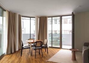 Comfort Suite Wheelchair Accessible | Living area | 50-inch flat-screen TV with cable channels