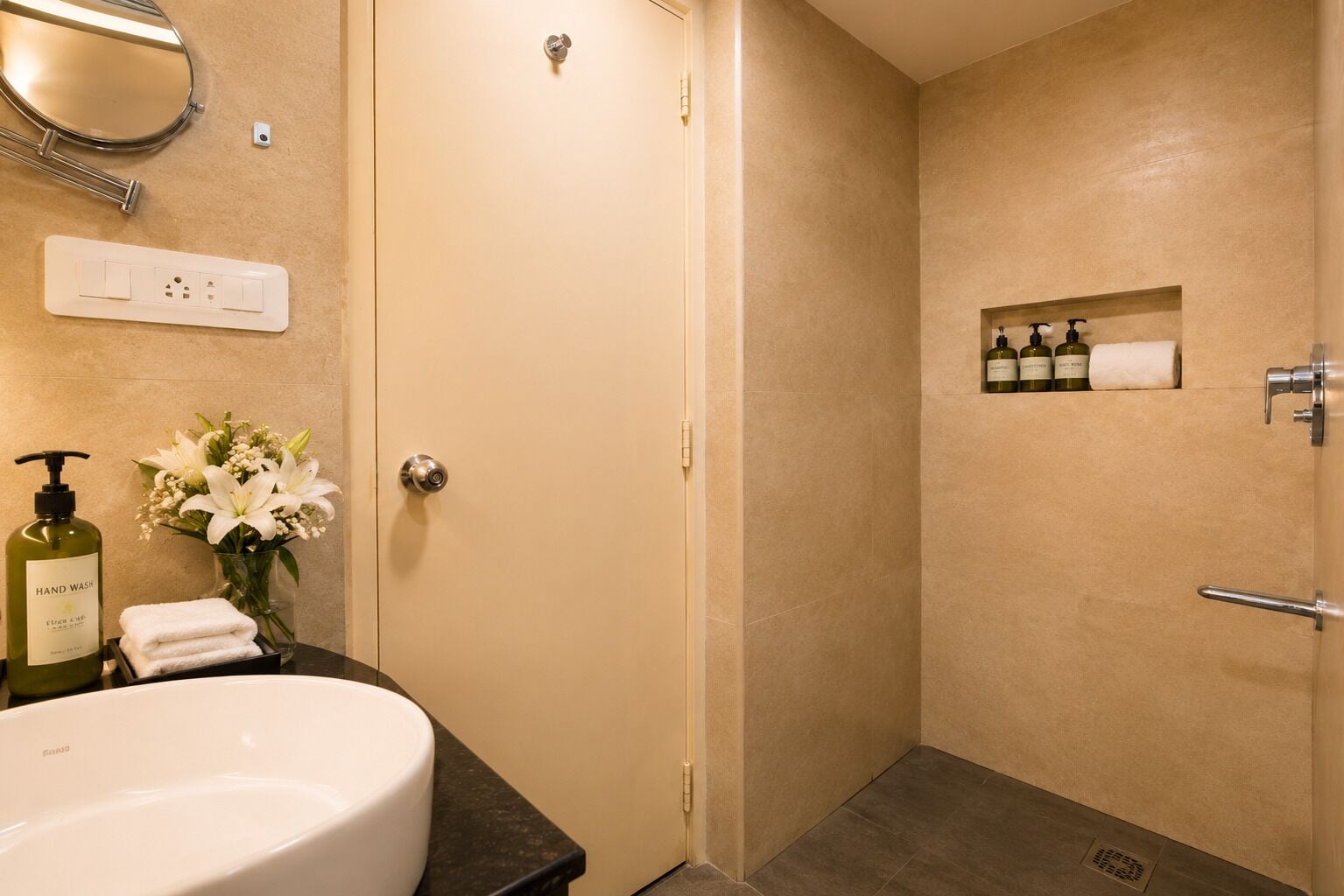 Shower, hydromassage showerhead, designer toiletries, hair dryer