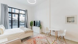 Room - HAVN - Studio Apartment in Pantheon Elysee, JVC (Dubai)