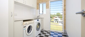 Family Coastal Retreat With Pool and Balcony Views