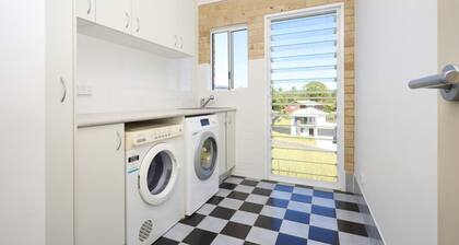 Family Coastal Retreat With Pool and Balcony Views