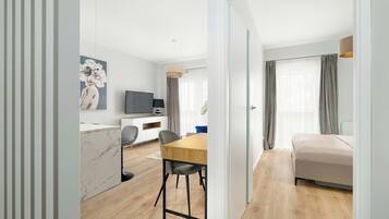1 bedroom, desk, iron/ironing board, travel cot