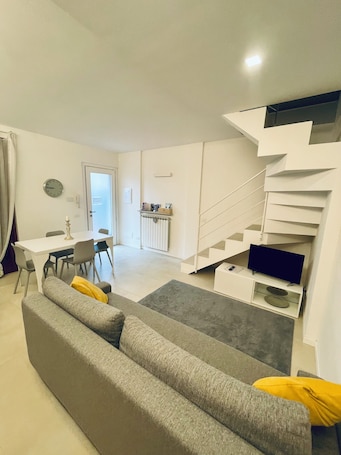 Living area. Sweet & Home 1 LOFT on two levels near bergamo