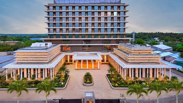 A multi-story hotel with a central courtyard, a modern architectural design, and a surrounding landscaped area. - The Residency Signature Madurai (Madurai)