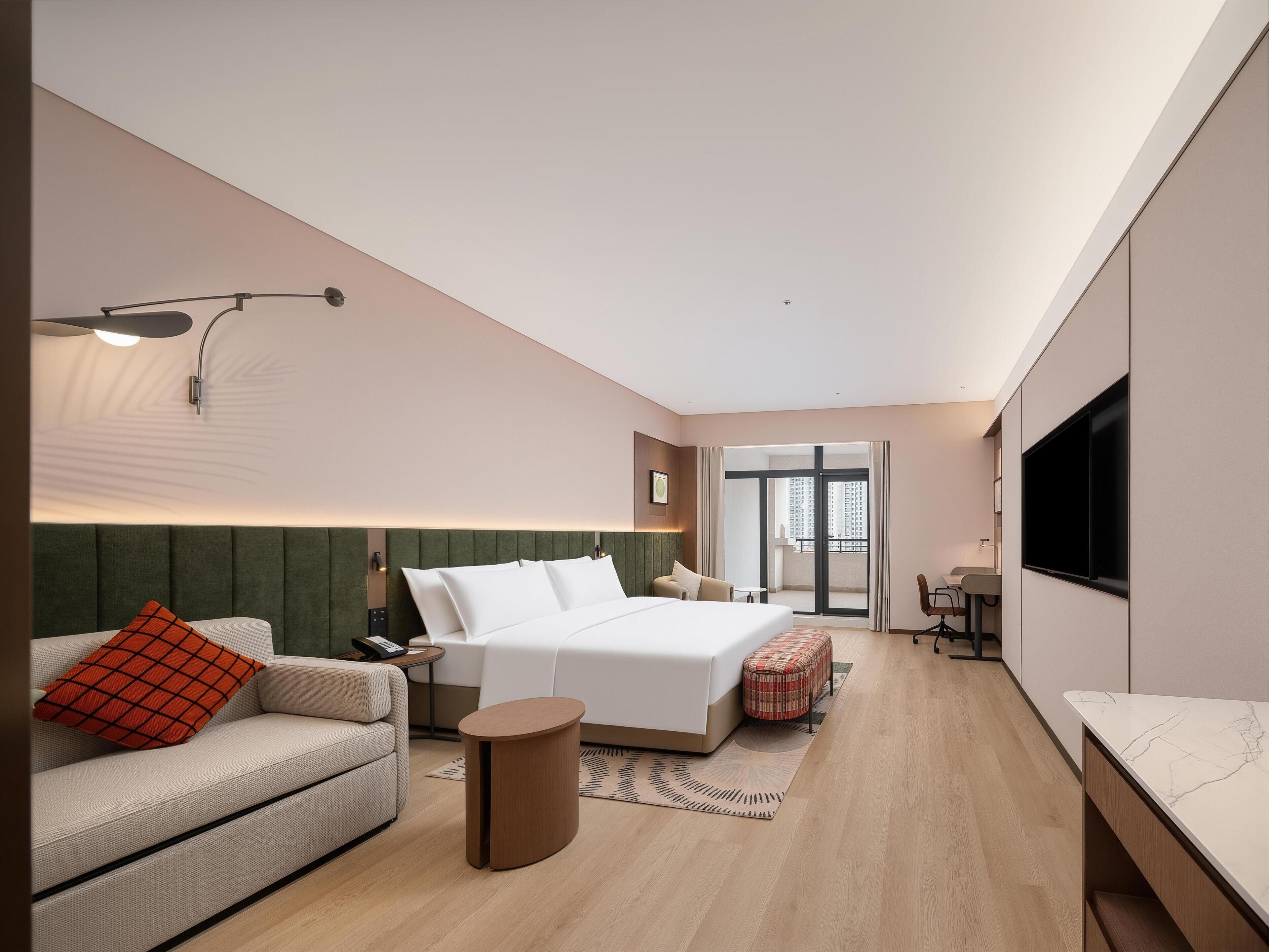 Quarto, 1 cama King e sofá-cama | Área de estar