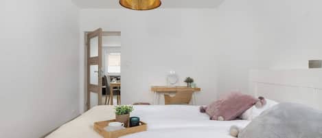 1 bedroom, desk, iron/ironing board, travel crib