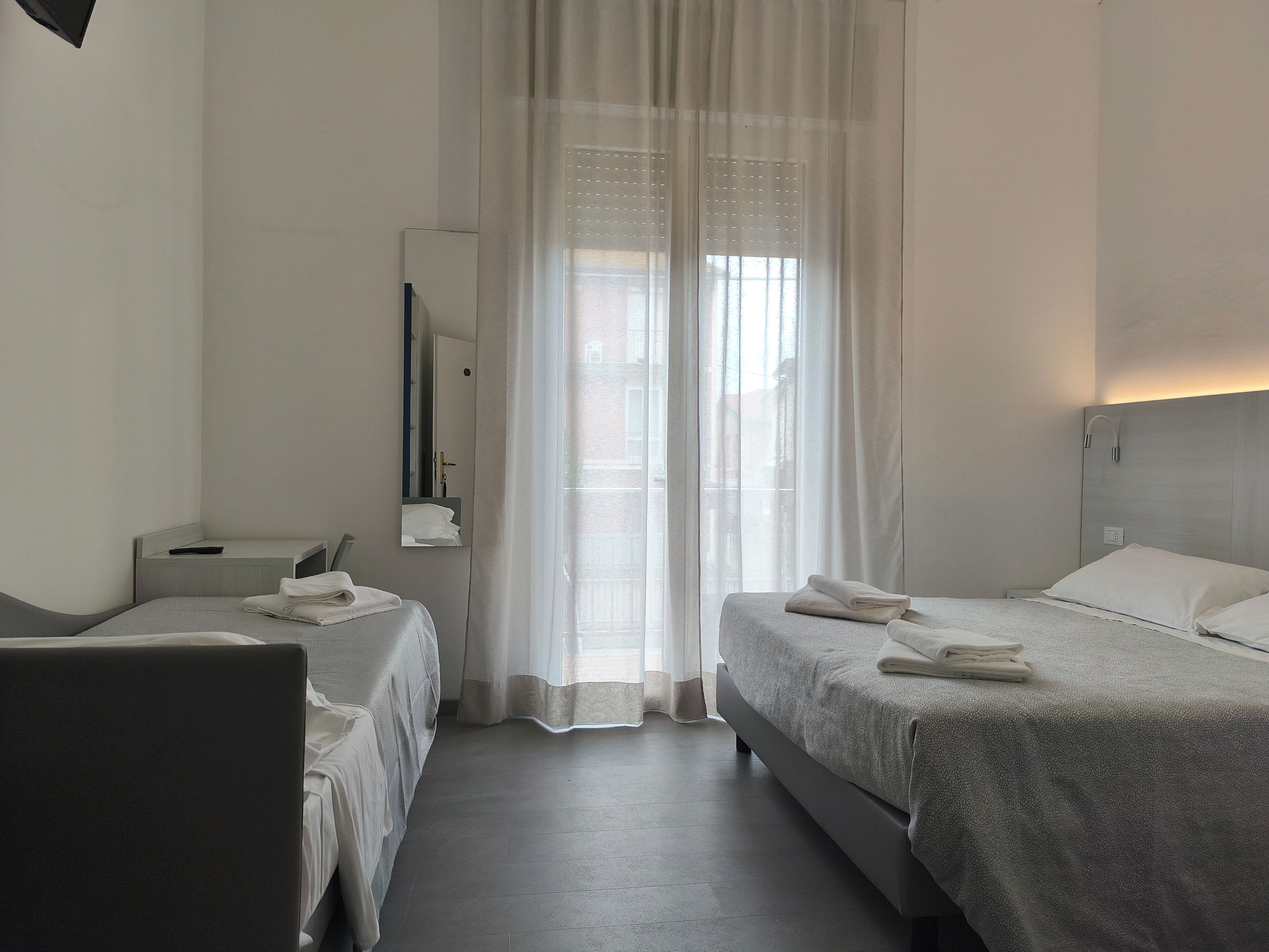 Desk, laptop workspace, free WiFi, bed sheets
