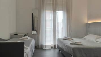 Desk, laptop workspace, free WiFi, bed sheets