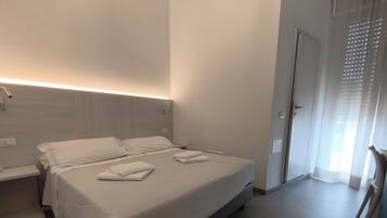 Desk, laptop workspace, free WiFi, bed sheets