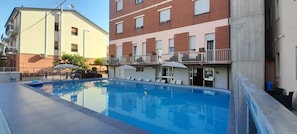 Seasonal outdoor pool, open 9:00 AM to 9:00 PM, pool umbrellas - Hotel Otello (Punta Marina)