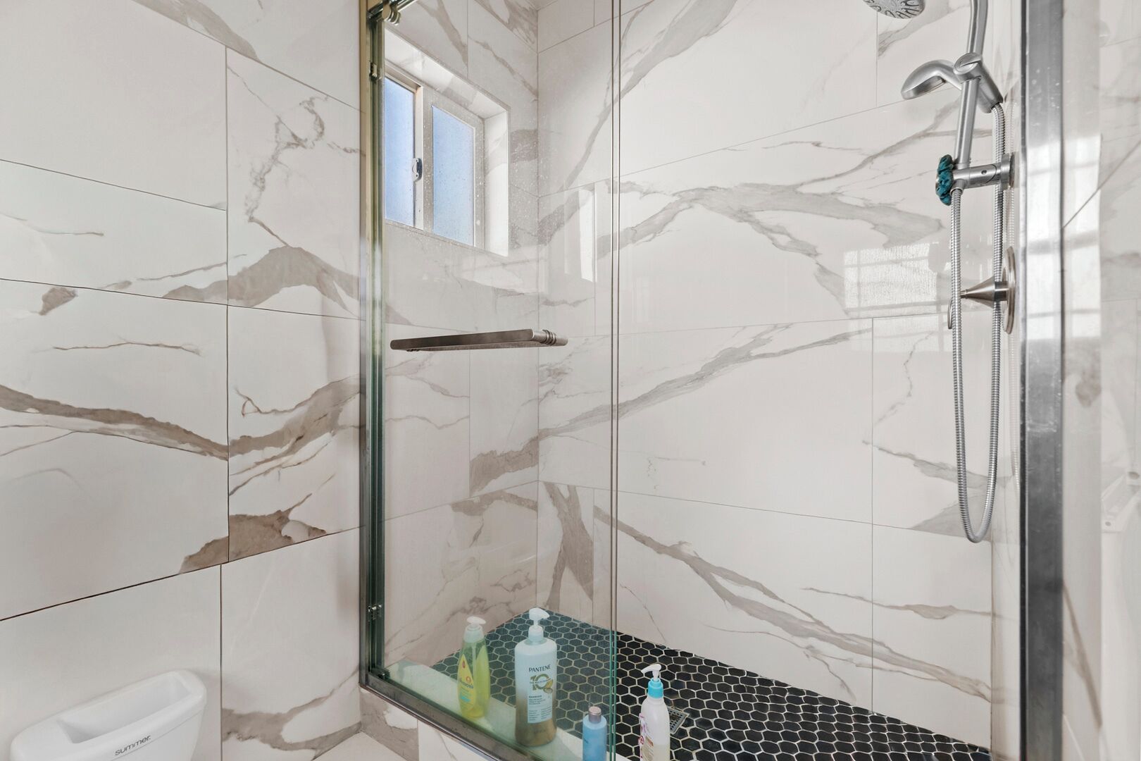 Shower, jetted tub, hair dryer, towels