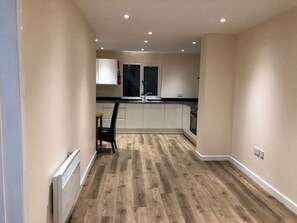 Superior Apartment | Private kitchen | Fridge, microwave, oven, stovetop