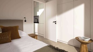 Une chambre à coucher moderne avec un lit, une table de chevet, un petit tabouret en bois et une armoire.