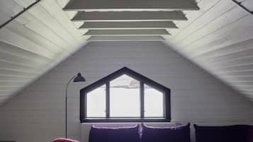 The Club House | Living area | 45-inch Smart TV with digital channels, Netflix, streaming services