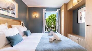 Coffres-forts dans les chambres, fer et planche Ă repasser