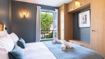 Coffres-forts dans les chambres, fer et planche Ă repasser