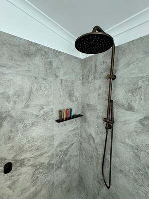 Shower, hair dryer, towels, soap