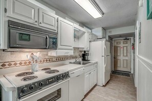 Fridge, microwave, oven, stovetop - Beachfront Corner Condo, 2BR (North Myrtle Beach)
