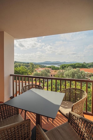 Comfort Apartment | Outdoor dining - Hotiday Punta Sardegna (Costa Serena)
